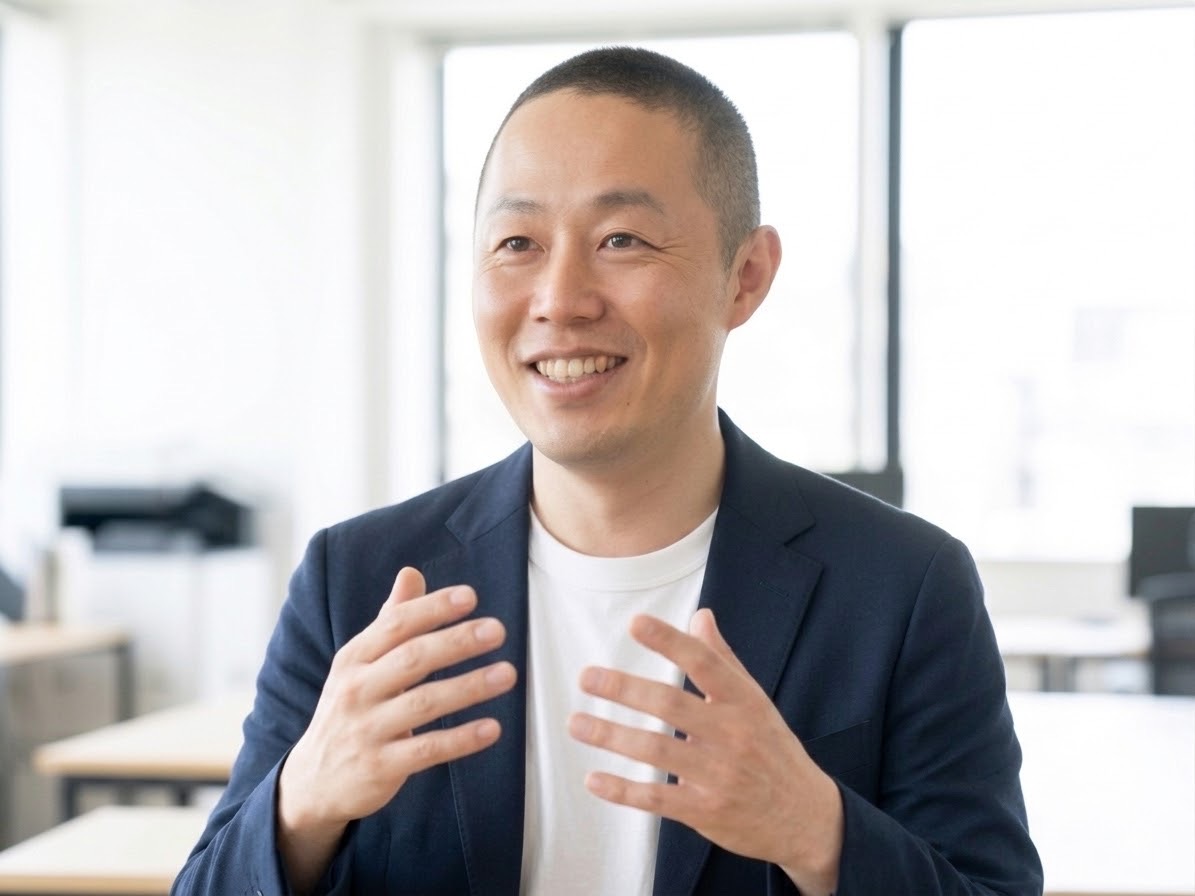 代表インタビューに答える楠本祥一