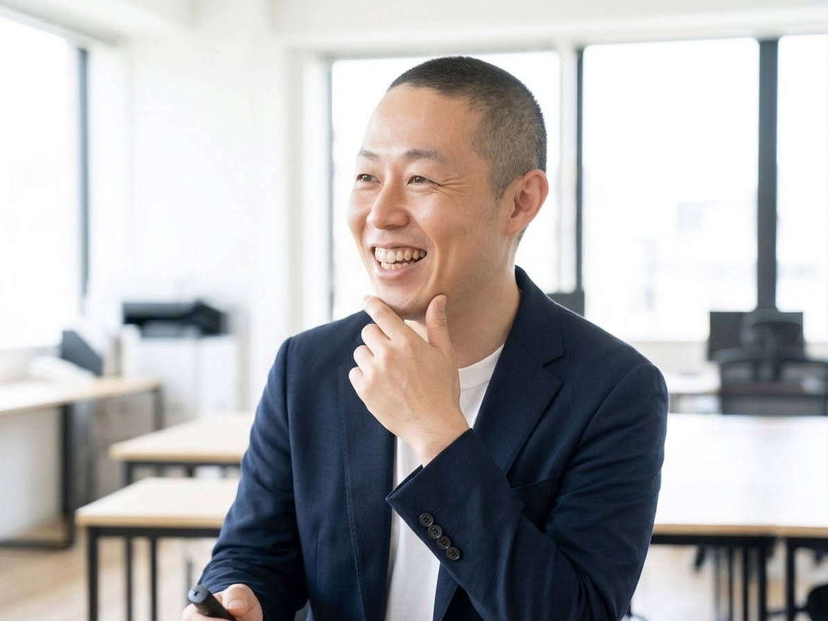 代表インタビューに答える楠本祥一