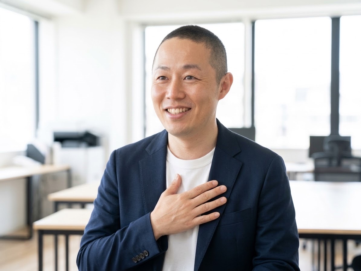 代表インタビューに答える楠本祥一